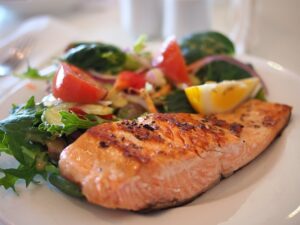 closeup shot of delicious salmon with vegetables